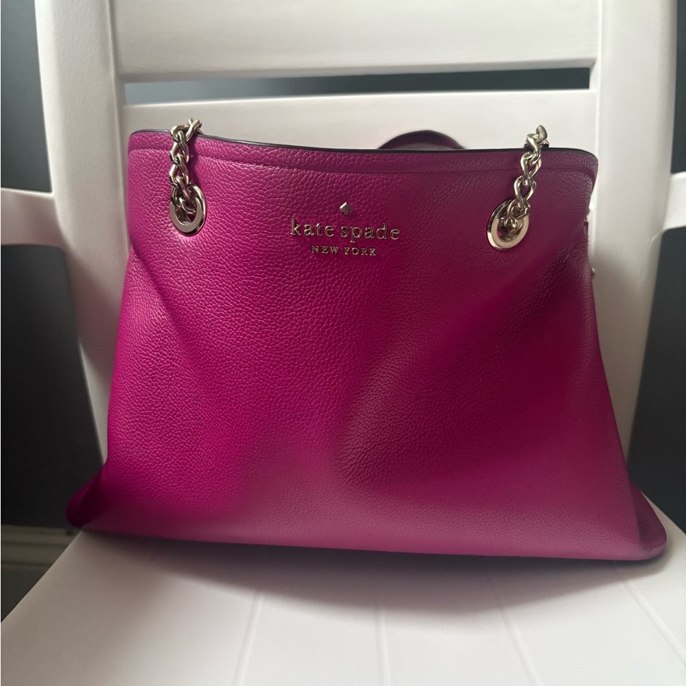 Kate Spade Vibrant Pink Shoulder Bag 
Used loved bag does need to be cleaned.